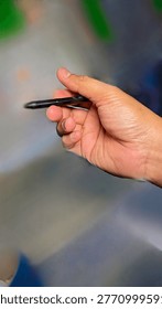 This shot captures the simple elegance of a mundane object and a human gesture, turning a 