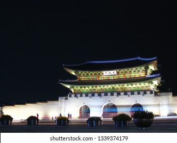 This Shot Is Kwanghwamun The Entrance Of Palace.
The Chinese Letters Mean Kwanghwamun(the Door Of Became A Light)
And The Vehicle Tracks Remain In Front Of Door.