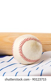 This Is A Shot Of An Old Baseball Sitting On A Blue Pinstripe Jersey With A Wooden Bat In The Background. Shot On A White Background.