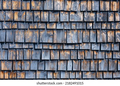 This Is The Side Of An Old Shaker Shingled Building With Old Blue Paint.