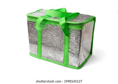 This is silver thermo bag for travel. This is isolated refrigerator bag. This is cooler box on white background.