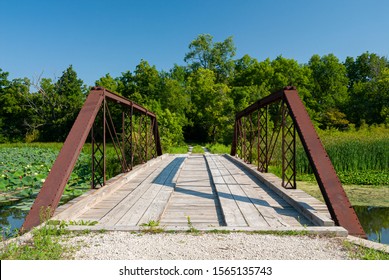 This small bridge allows the crossing over a backwater channel of the DesPlaines River in the DesPlaines River State Fish and Wildlife Area in Will County, Illinois