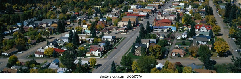 This Is A Small Town In The Western Part Of The United States. It Is Autumn And Shows Small Town America With Houses Lined Up On Tree Lined Suburban Streets.