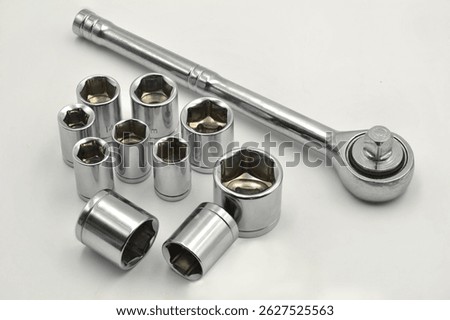 This socket wrench set includes multiple sizes, ideal for mechanical tasks and home improvement. Durable design ensures long-lasting use.
