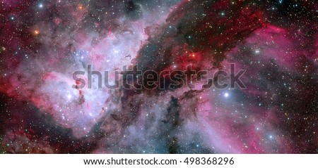 This spectacular panoramic view cof the Carina Nebula with an earlier picture of the region around the unique star Eta Carinae in the heart of the nebula. Elements of this image furnished by NASA.