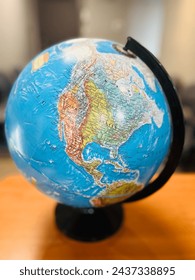 This stock image features a shuttle orbiting the Earth, highlighting the globe in the background. The shuttle, with its sleek design and prominent silhouette, gracefully navigates the vast expanse.