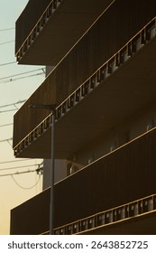 This is a structure characterized by an abundance of balconies that enhance its aesthetic appeal and functionality for the residents