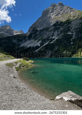 This stunning image captures Seebensee in Austria, situated near the majestic Alps and close to Zugspitze, the highest peak in Germany