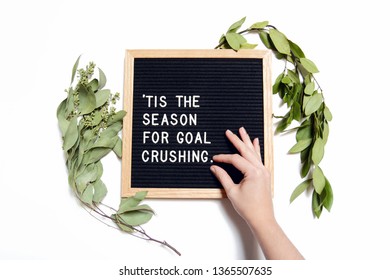 This styled stock photo features a classic letter board with a fun motivational quote perfect for your creative business or blog! Greenery and a little touch of human bring this image together.