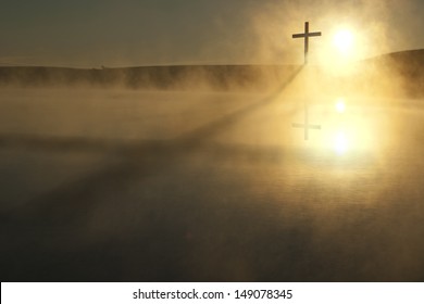 This Sunrise Cross on a misty lake casts a lengthy shadow and reflection on this calm Easter Morning Illustration