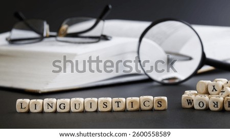 This symbolic image emphasizes the academic exploration of language, ideal for illustrating university lectures, research, or linguistic resources globally.  Photo. Copy space