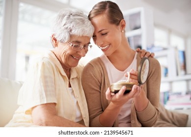 This Is Their Family Heirloom. Cropped Shot Of A Senior Woman Giving Her Daughter A Pearl Necklace.