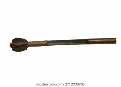 This tool features an intricately designed handle and a functional end, showcasing craftsmanship from a specific historical era. It represents traditional methods and artistry.