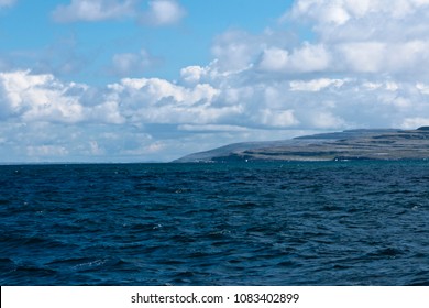 This townland, Ballyryan of County Claire.  Foreground is the waters of the Altantic Ocean and Galway Bay.  From the ferry to Inishmore, Aran Islands, County Galway, Ireland.