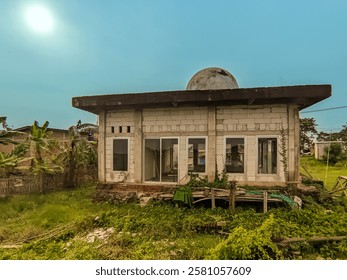 This unique mosque has a simple yet distinctive design, featuring a dome in the shape of a hemisphere. 