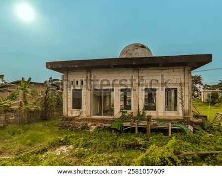 This unique mosque has a simple yet distinctive design, featuring a dome in the shape of a hemisphere. 