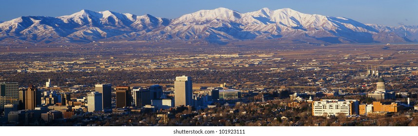 This Is Utah's State Capitol With The Great Salt Lake And Snow Capped Wasatch Mountains In Morning Light.