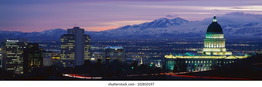 This Is Utah's State Capitol, Great Salt Lake And Snow Capped Wasatch Mountains At Sunset.