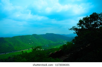 This Is A Very Beautiful Scene With Green Mountains Blue Sky And White Clouds Captured From Jaigarh Fort  Located At Jaipur City Rajasthan India