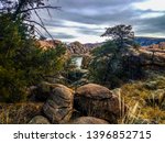 This is a view of Watson Lake in the Granite Dells of Prescott, AZ. This image was taken through the foliage on the loop trail looking east across the lake.