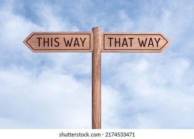 This way or That Way concept. Words in opposite directions on signpost with sky background - Shutterstock ID 2174533471