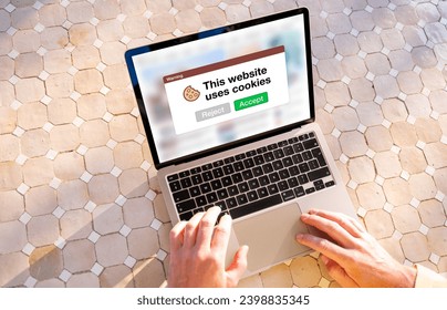 This website uses cookies warning pop-up window on laptop