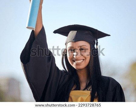 This is what dedication gets you. Portrait of a young woman holding her diploma on graduation day.