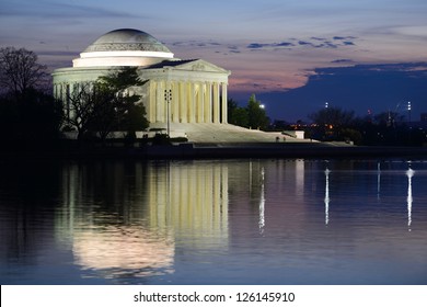 Thomas Jefferson Memorial Silhouette At Sunrise With Mirror Reflection On Water, Washington DC United States