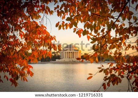 Thomas Jefferson memorial from Tidal basin, Washington D.C. in Fall during sunset 