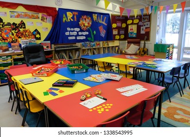 THORNTON, MILTON KEYNES, UK - FEBRUARY 2, 2019: Empty UK elementary school classroom set up for the start of the day, with games and activities prepared.