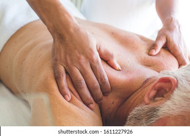 Thoroughly relaxed and de-stressed. Senior man on massage. - Powered by Shutterstock