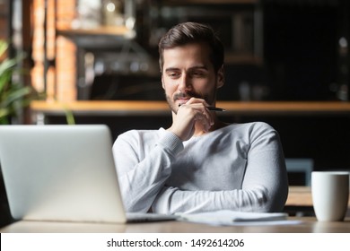 Thoughtful businessman think of online project looking at laptop at workplace, dreamy professional consider solution sit at work desk with computer, student search new idea inspiration in office cafe - Shutterstock ID 1492614206