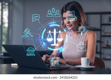 Thoughtful businesswoman in casual wear typing on laptop at office workplace with coffee cup. Concept of distant work, business education, internet surfing, information technology. Legal and law - Powered by Shutterstock