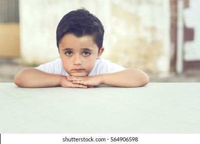 Thoughtful child - Powered by Shutterstock