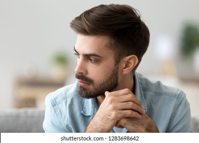 Thoughtful Concerned Millennial Man Thinking About Problem Solution, Worried Anxious Pensive Guy Lost In Thoughts Reflecting Troubled With Making Difficult Decision Feeling Down Depressed Or Doubtful