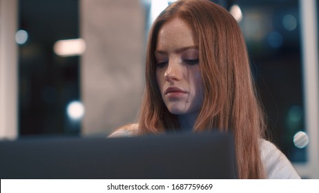 Thoughtful Concerned Young Woman Works On Laptop Computer Think Solving Problem At Modern Apartment Serious Woman Search For Inspiration Make Decision Feel Lack Of Ideas Close Up Freelancer