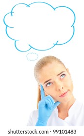 Thoughtful female doctor isolated over a white background. Blank cloud balloon overhead