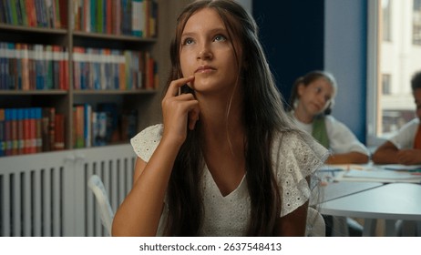 Thoughtful girl kid child daughter schoolgirl pupil teen student learner pensive think learning task homework lesson studying in classroom school education library academy thinking dreaming imagine