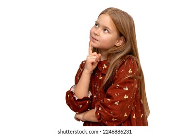 Thoughtful little girl daughter look away on copy space thinking isolated on white background, funny kid pout lips hold finger near mouth conceived some kind of prank - Shutterstock ID 2246886231