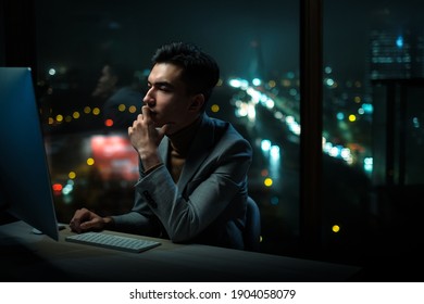 Thoughtful Man Read Business Plan on Computer - Shutterstock ID 1904058079