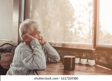 Thoughtful Serious Anxious Mature Senior Woman Feeling Worried About Problems. Concept Dramatic Loneliness, Dementia, Abuse, Sadness, Depression, Sad Emotions, Cry, Disappointed, Healthcare, Pain.