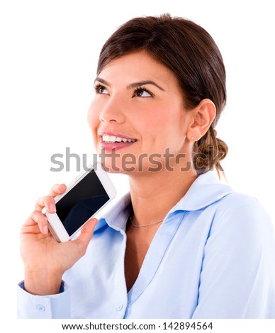 Thoughtful woman with a cell phone - isolated over a white background