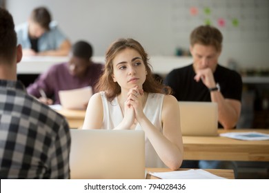 Thoughtful Woman Thinking Of New Idea Sitting At Desk With Laptop In Co-working Space, Distracted Company Employee Lost In Thoughts Working In Office, Absent-minded Intern Dreams Of Successful Career