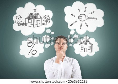 Thoughtful young european businessman with abstract glowing house sketch on dark background. Real estate and mortgage concept