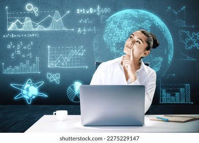 Thoughtful young european businesswoman with laptop and glowing mathematical formulas and globe hologram on blurry blue background. Equation, digital data and mathematics app concept