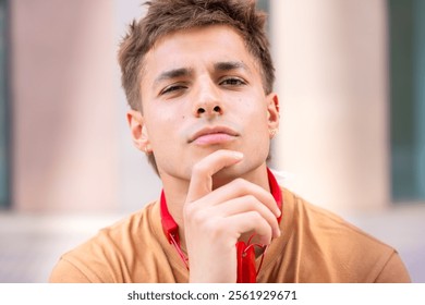 Thoughtful Young Man with Red Headphones - Powered by Shutterstock