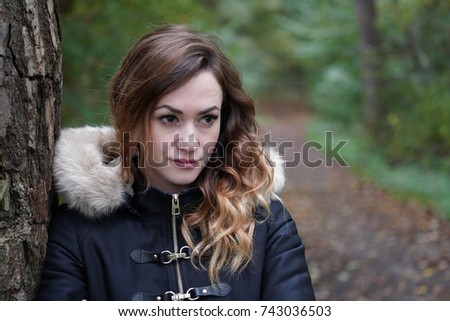 Similar – Image, Stock Photo contemplative young woman in winter jacket