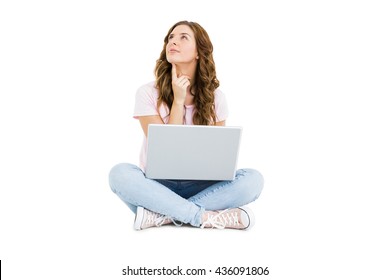 Thoughtful Young Woman Using Laptop On White Background