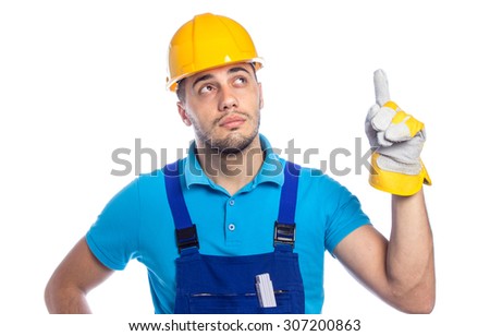 Thoughtfull builder pointing up to something, isolated on white background