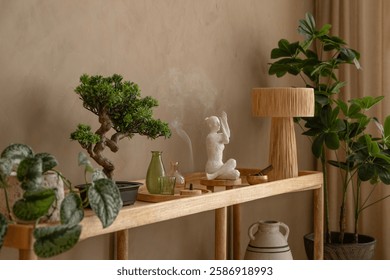 A thoughtfully styled console table with ceramic vases, a burning incense stick, and soft neutral hues for a soothing interior.